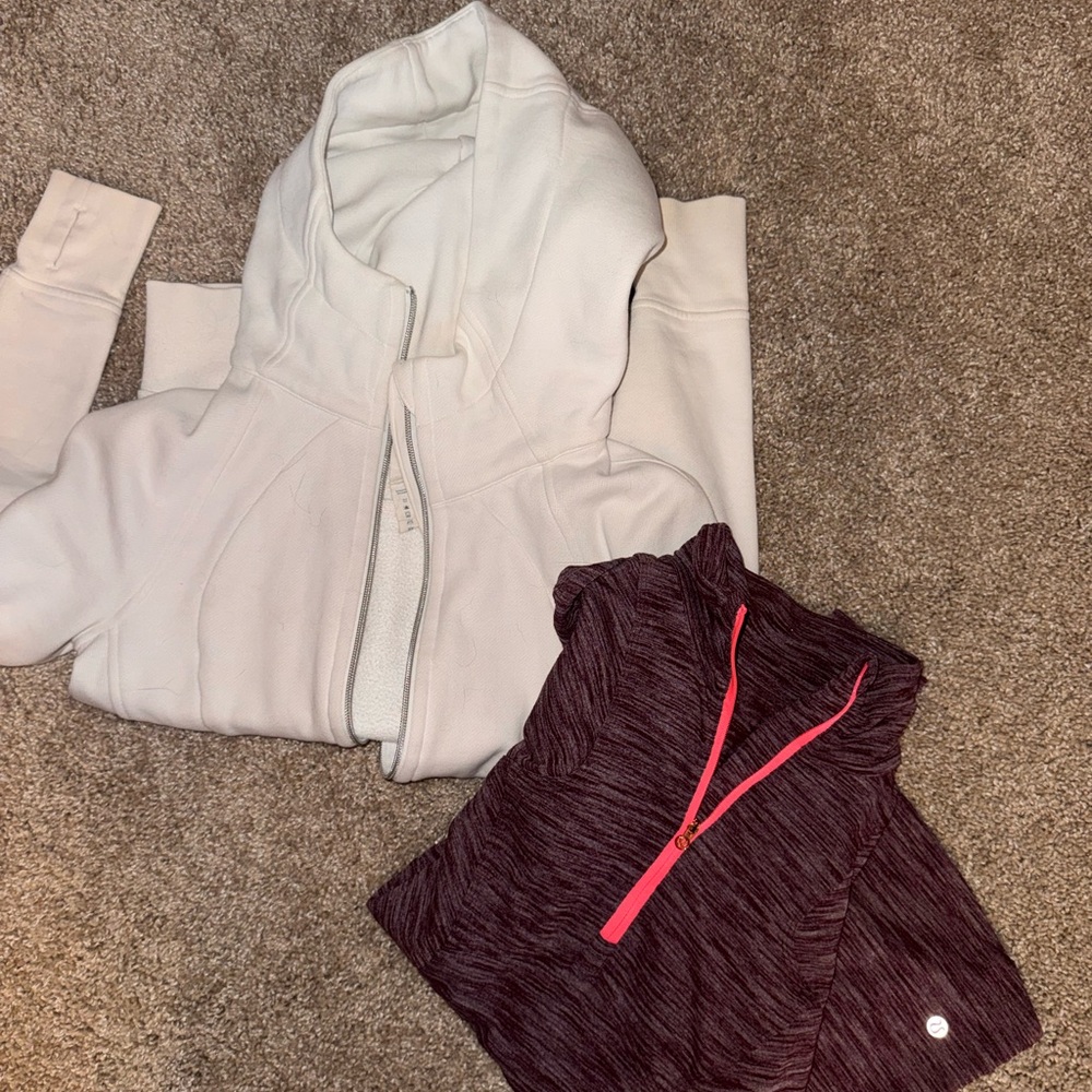 2 for 1- lulu lemon white zip up (4) and pink quarter zip (2)